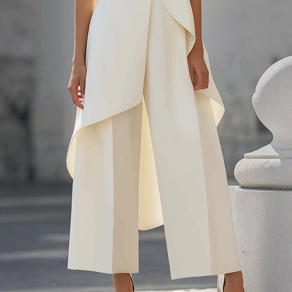 Pantalone a gamba larga: allunga otticamente la silhouette e garantisce comfort per tutto il giorno.